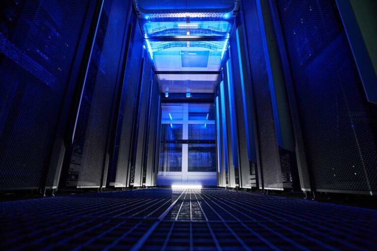 FeatureImage_A_Modern_Data_Center_Server_Room_with_Blue_Neon_Lighting_Featuring_Tall_Sleek_Server_Ra.jpeg