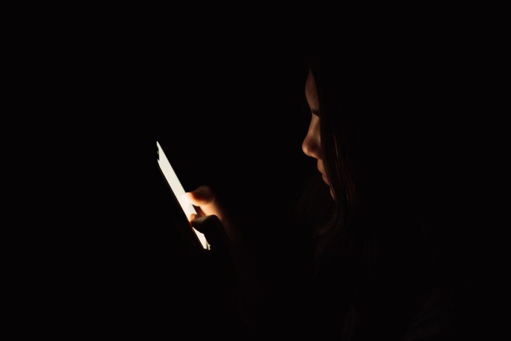 dark-phone-person-spyware.jpg