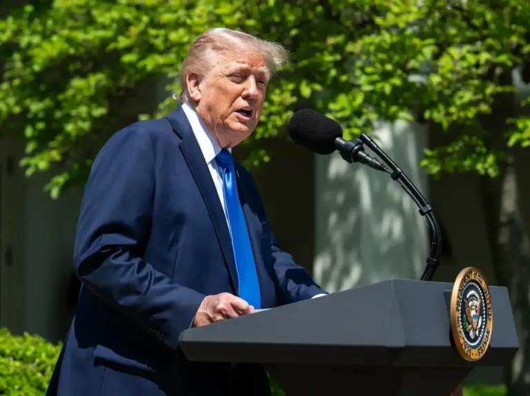 donald-trump-speaking-white-house-podium-inline.webp.webp